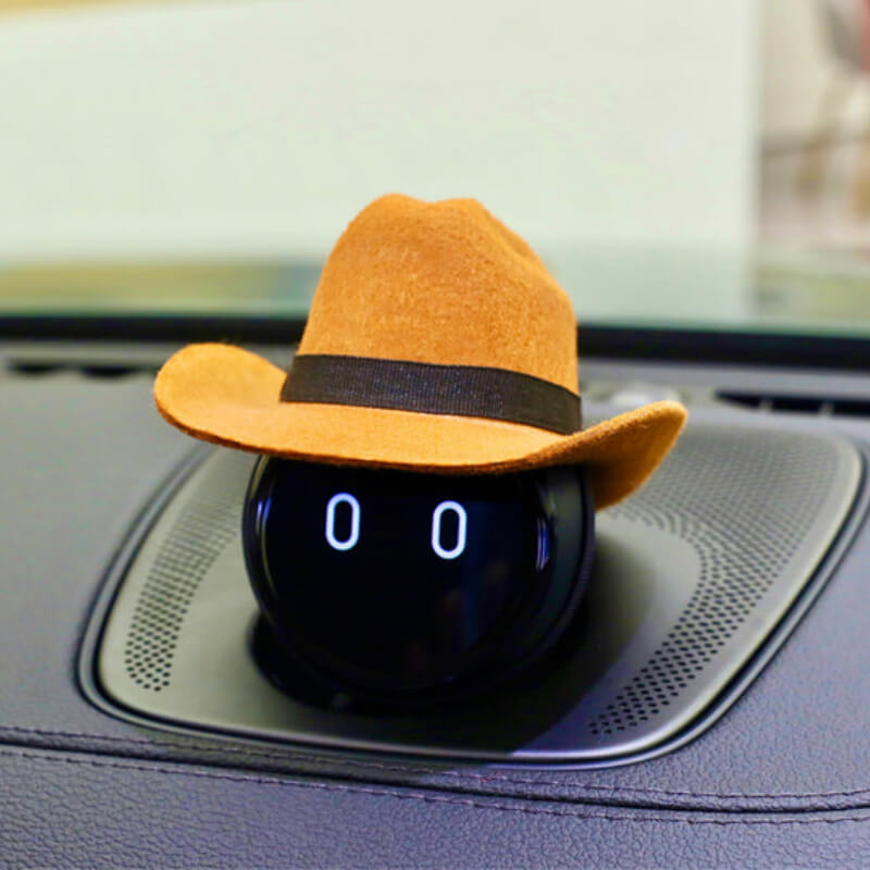 The yellow cowboy hat is decorated with a riband, which is a very classic look.