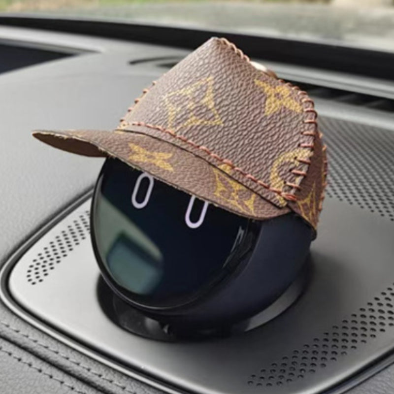 The brown printed leather baseball cap looks very fashionable on NOMI.